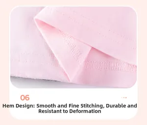 Detail of pink cotton dress hem with professional double-needle stitching quality