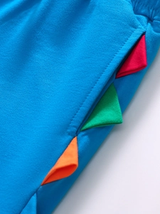Ensemble en coton pour garçon bleu avec détails de nageoires 3D colorées style dinosaure