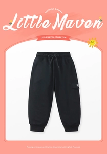 Detail of black cotton girls joggers featuring elastic drawstring waist and side cargo pocket