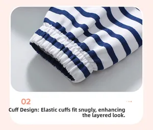 Detailed macro view of elastic shirred cuffs on blue and white striped jersey sleeves