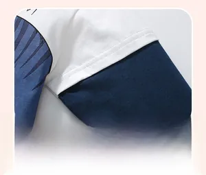 Detailed close-up of premium cotton contrast sleeve stitching on boys t-shirt