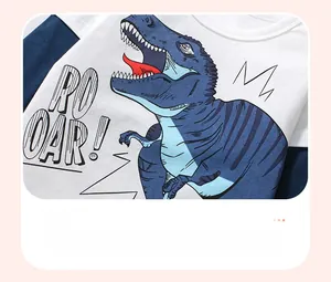 Detail of water-based T-Rex print and contrast sleeves on cotton toddler T-shirt