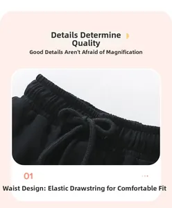 Detail of girls' black leggings showing elastic waistband with adjustable drawstring
