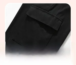 Detail of a functional flap pocket on a black cotton knit toddler outfit set