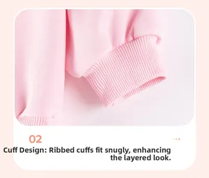 Close-up of pink knit sweatshirt ribbed cuffs with elastic fitting for comfort