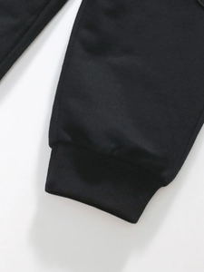 Girls black cotton leggings featuring tight ribbed cuffs for autumn casual wear
