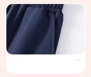 Detail of navy blue cotton t-shirt showing high-quality pocket stitching and ribbed texture