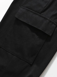 Boys' black cotton cargo set featuring a detailed close-up of a functional flap pocket