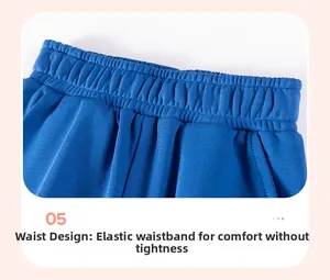 Detail of royal blue elastic waistband on knit trousers for a comfortable fit