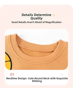 Detail of ribbed crew neck and reinforced stitching on yellow cartoon kid's sweatshirt