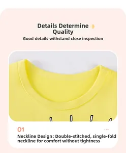 Detail view of double-needle stitching on yellow cotton crewneck t-shirt for boys