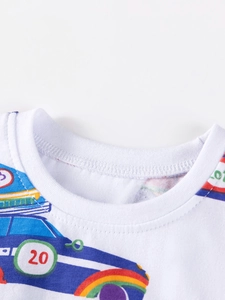 Neckline detail of a white cotton kids' long sleeve T-shirt with a blue cartoon race car print