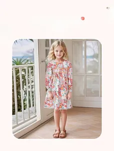 Long-sleeved floral cotton dress for girls with red and orange flower patterns and ribbed cuffs