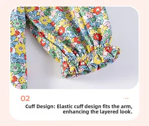 Close-up of vibrant floral print cotton fabric with elastic ruffled cuffs on the sleeve
