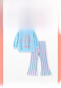 Detail of girls' blue sweatshirt with turtle print and striped bell-bottom pants set