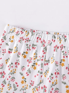 Floral print kids cotton pants with elastic waistband and pink flower pattern