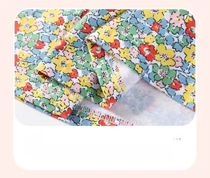 Detailed macro view of cotton floral dress hem with smooth and durable double stitching
