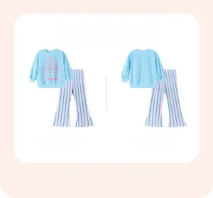 Close-up of girls' blue long-sleeve sweatshirt with turtle print and striped flared pants