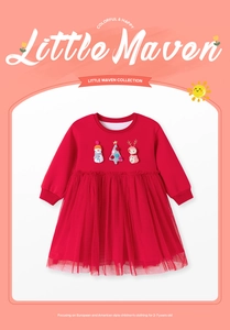 Close-up of girls red Christmas tulle dress with reindeer and snowman embroidery details