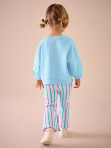 Cute girls striped cotton outfit with blue sweatshirt and ribbed flare pants