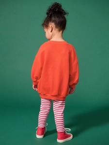 Mädchen Set mit orangefarbenem Sweatshirt und rot-weiß gestreifter Leggings