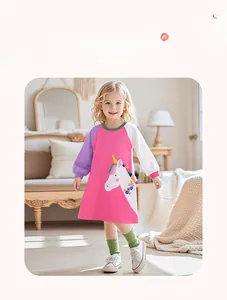 Detail of long sleeve cotton dress for girls with unicorn print and colorblock sleeves