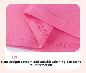 Detail view of pink cotton dress hem showing fine stitching and smooth durable texture