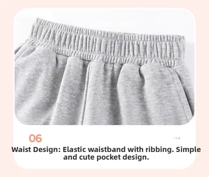 Detail of grey knit shorts featuring an elastic waistband and simple side pockets