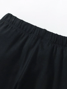 Pantaloni neri per bambina con vita elastica e cuciture rinforzate in morbido cotone traspirante