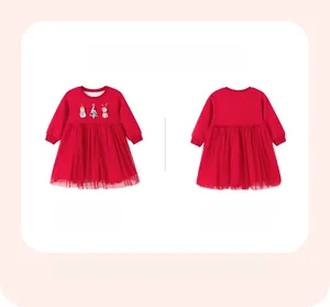 Front and back view of red Christmas tutu dress with festive applique and mesh skirt