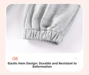 Close-up of elastic ribbed cuffs on gray cotton knit toddler joggers for boys