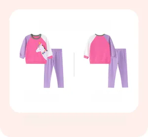 Flat lay front and back view of girls' unicorn pajamas with long sleeves and purple pants