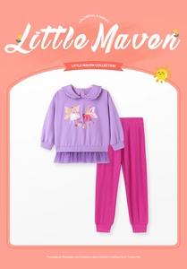 Detail of girls purple sweatshirt with butterfly embroidery and ruffle trim