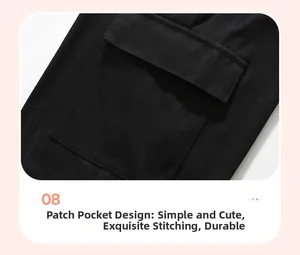 Détail d'un sweat à capuche noir pour enfant avec poche plaquée et coutures de précision