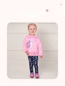 Detail of pink toddler sweatshirt with hedgehog embroidery and matching printed pants