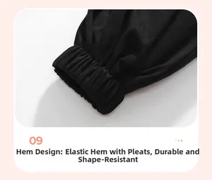 Détail des poignets élastiqués d'un sweat noir pour fille assurant tenue et durabilité