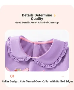 Detailed view of girls' purple top featuring a ruffle Peter Pan collar and soft knit fabric