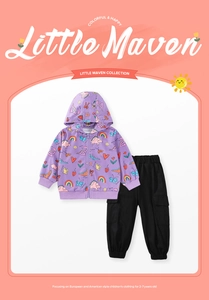 Detailed view of girls purple dinosaur hoodie and black cargo pants two-piece set