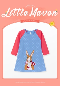Detail of blue polka dot girls' dress with rabbit applique and pink raglan sleeves