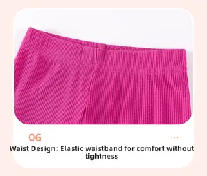 Detail of elastic ribbed waistband on rose red knitted toddler pants for girls