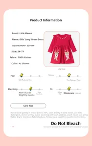 Detail showing red polka dot cotton girls' dress with cute reindeer embroidery and ruffles