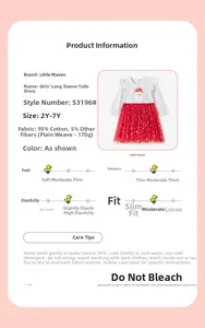 Detail of Christmas girl dress featuring Santa Claus embroidery and red starry tulle skirt