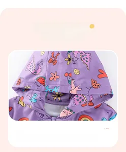Detail of purple toddler hoodie featuring cute dinosaur prints and durable hemmed edges