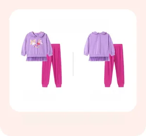 Detail of girls purple fairy top with mesh hem and magenta pants front and back view