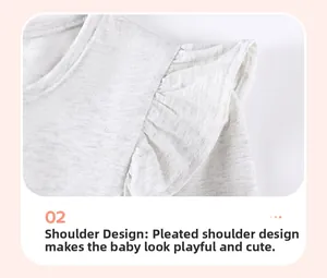 Detail of light gray baby cotton top with ruffled shoulders and precise stitching