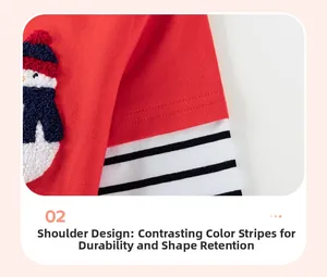 Détail d'un pull rouge pour enfant avec couture d'épaule rayée et broderie bonhomme de neige