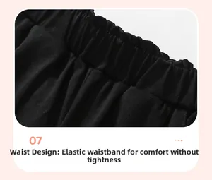 Close-up of elastic waistband detail on black knitted hooded sweatshirt for girls