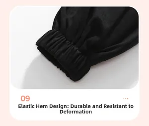 Detail view of elastic ribbed cuffs on black cotton toddler joggers for durable wear