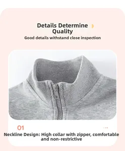 Detail shot of the ribbed high collar and front zipper on this grey kids sweatshirt