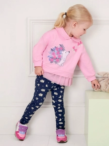 Pink girl's autumn outfit with cartoon hedgehog sweater and navy blue floral pants